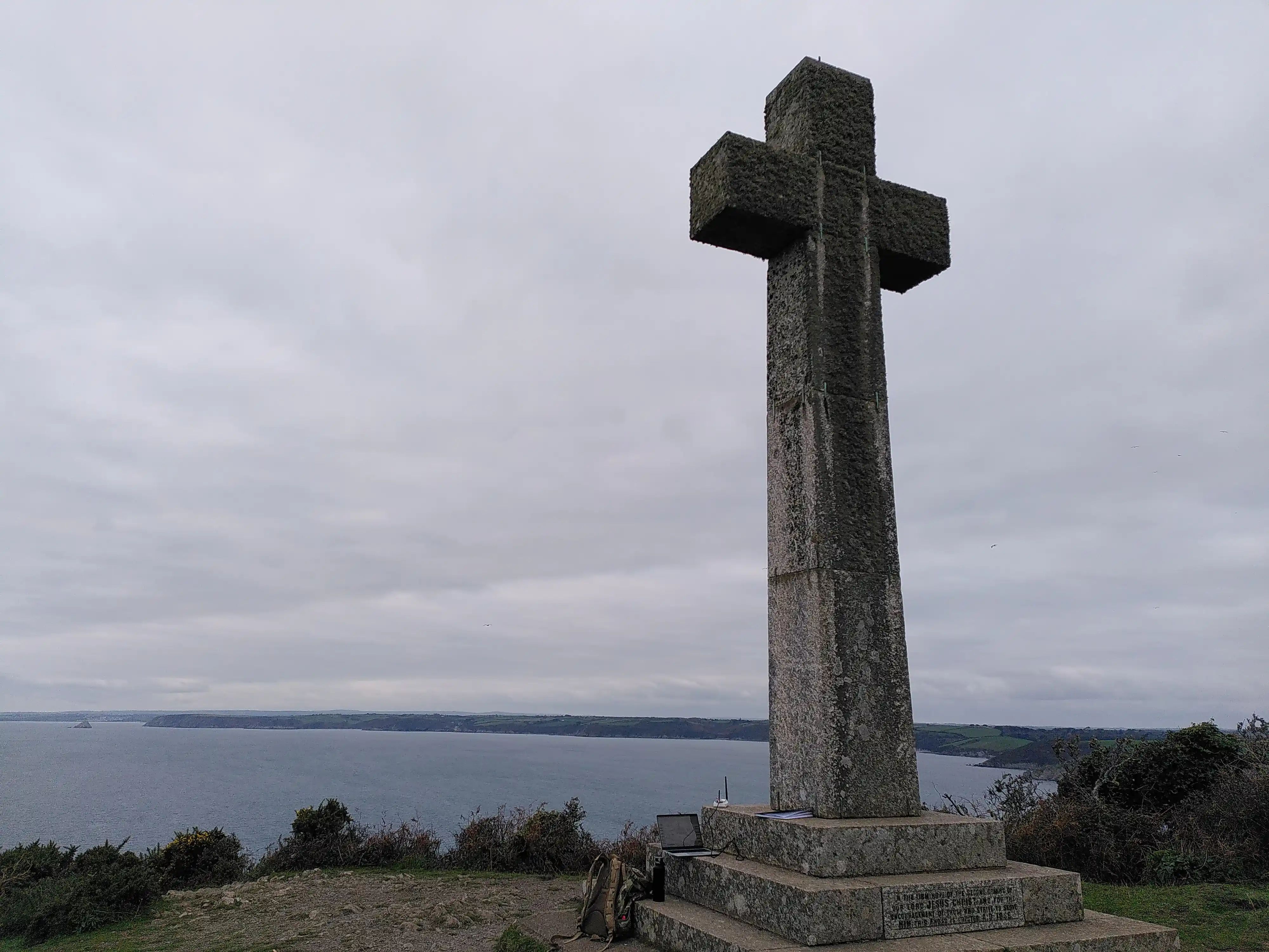 A cross with my laptop and radio at the bottom